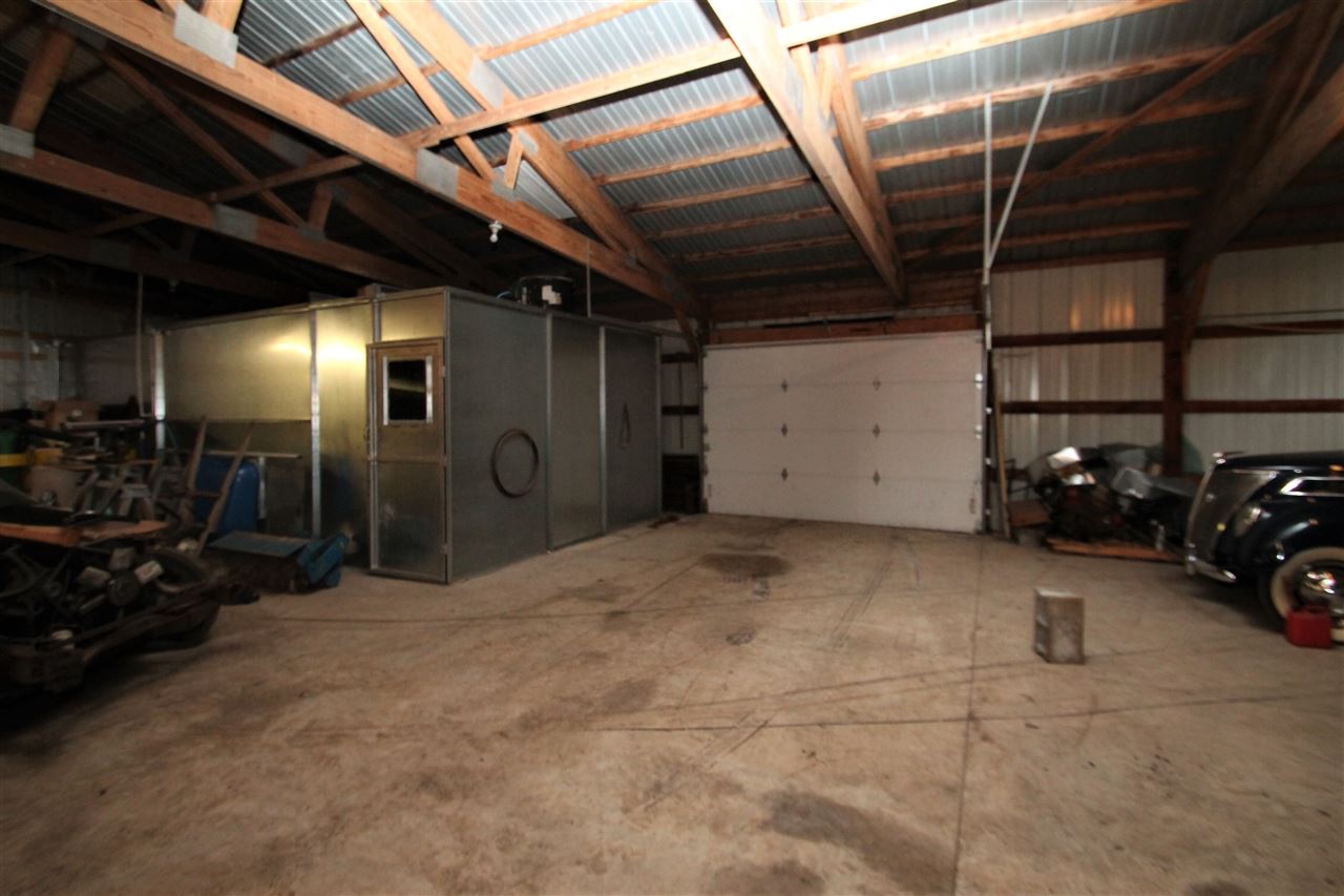 8502 Burr Oak Road Roscoe, IL 61073 - Photo 13 of 14 a view of a garage with storage