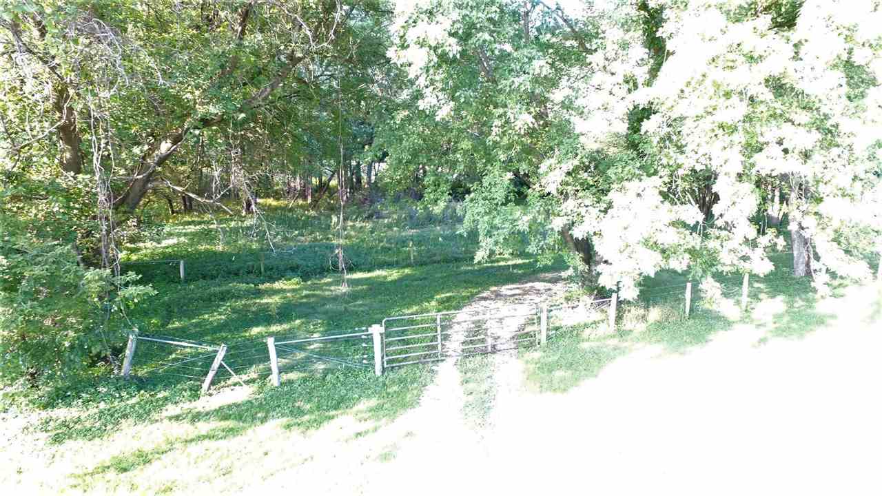 8502 Burr Oak Road Roscoe, IL 61073 - Photo 4 of 14 a view of a park with large trees