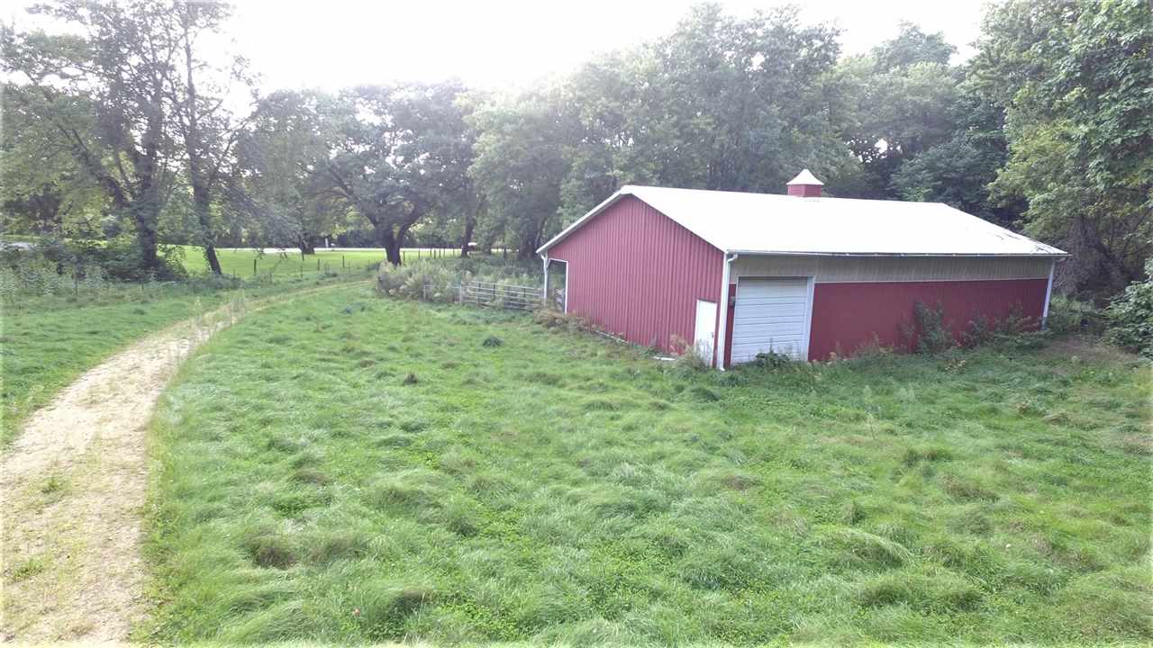 8502 Burr Oak Road Roscoe, IL 61073 - Photo 9 of 14 a view of a backyard