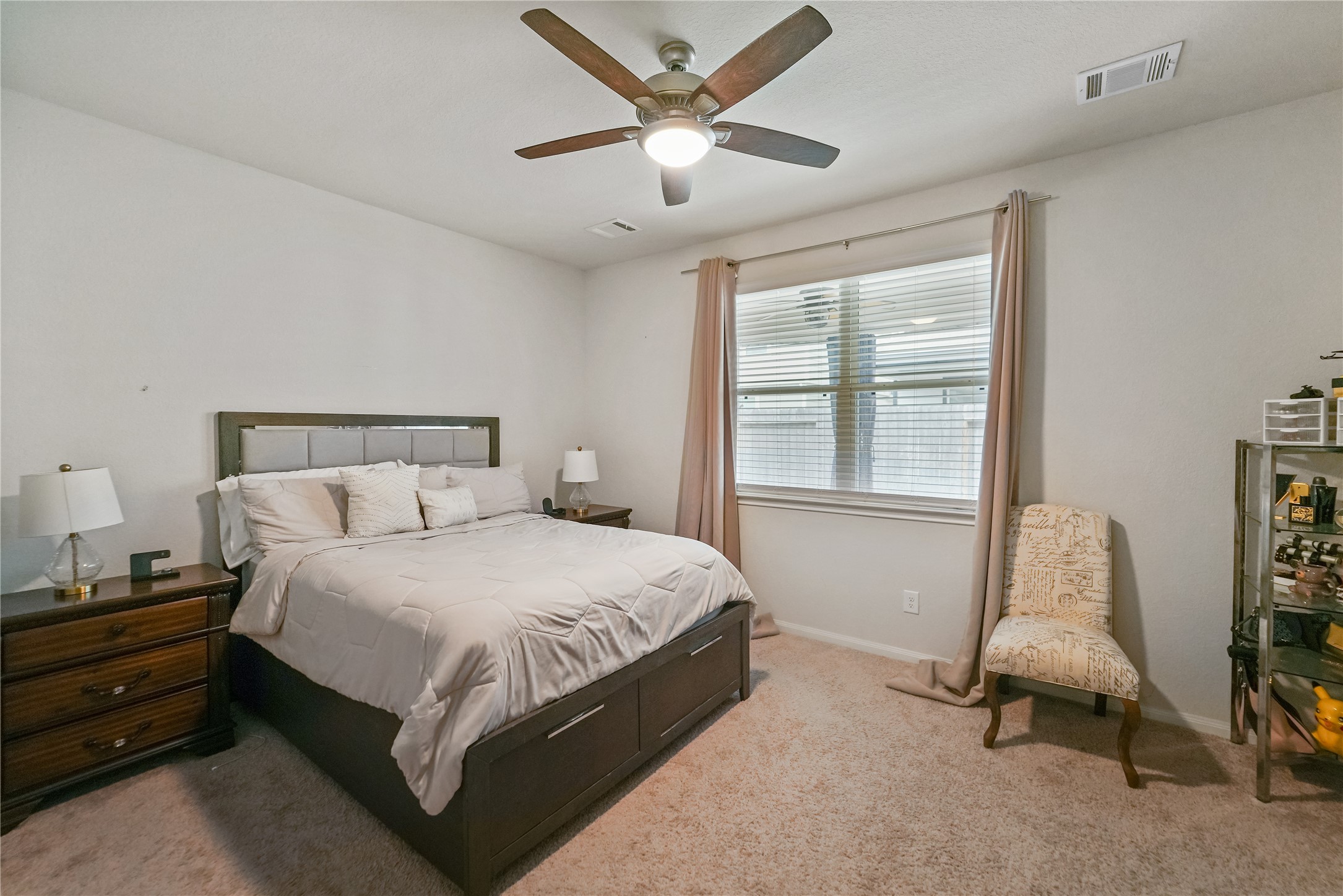 23659 Goodfellow Drive Spring, TX 77373 - Photo 11 of 25 a bedroom with a bed and a window