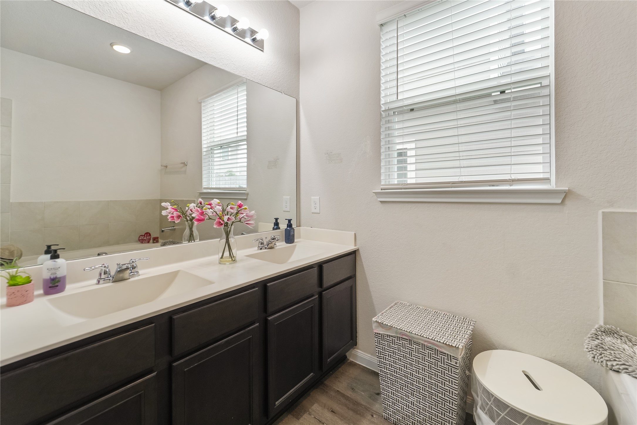 23659 Goodfellow Drive Spring, TX 77373 - Photo 13 of 25 a bathroom with a sink vanity mirror and toilet