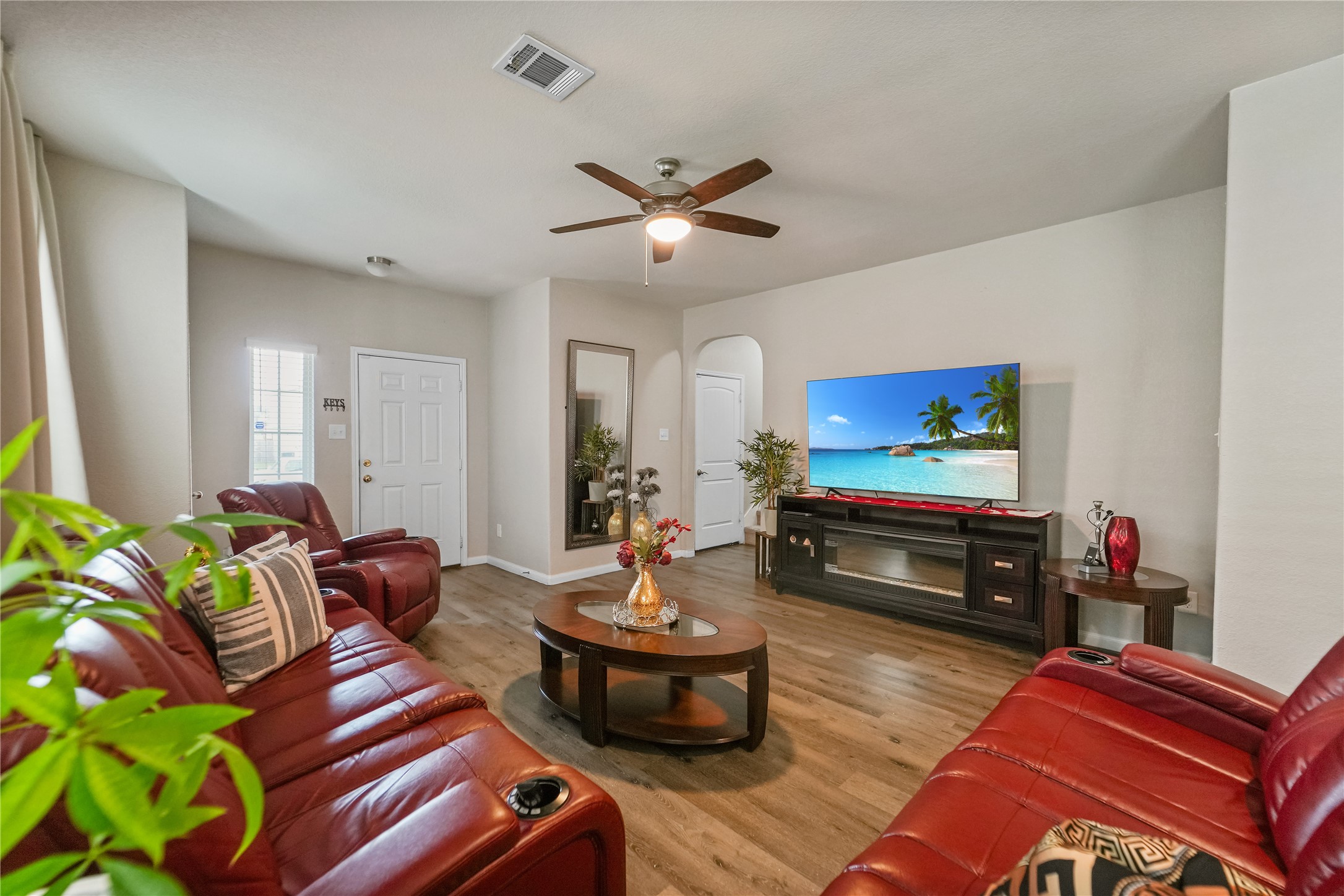 23659 Goodfellow Drive Spring, TX 77373 - Photo 4 of 25 a living room with furniture and a flat screen tv
