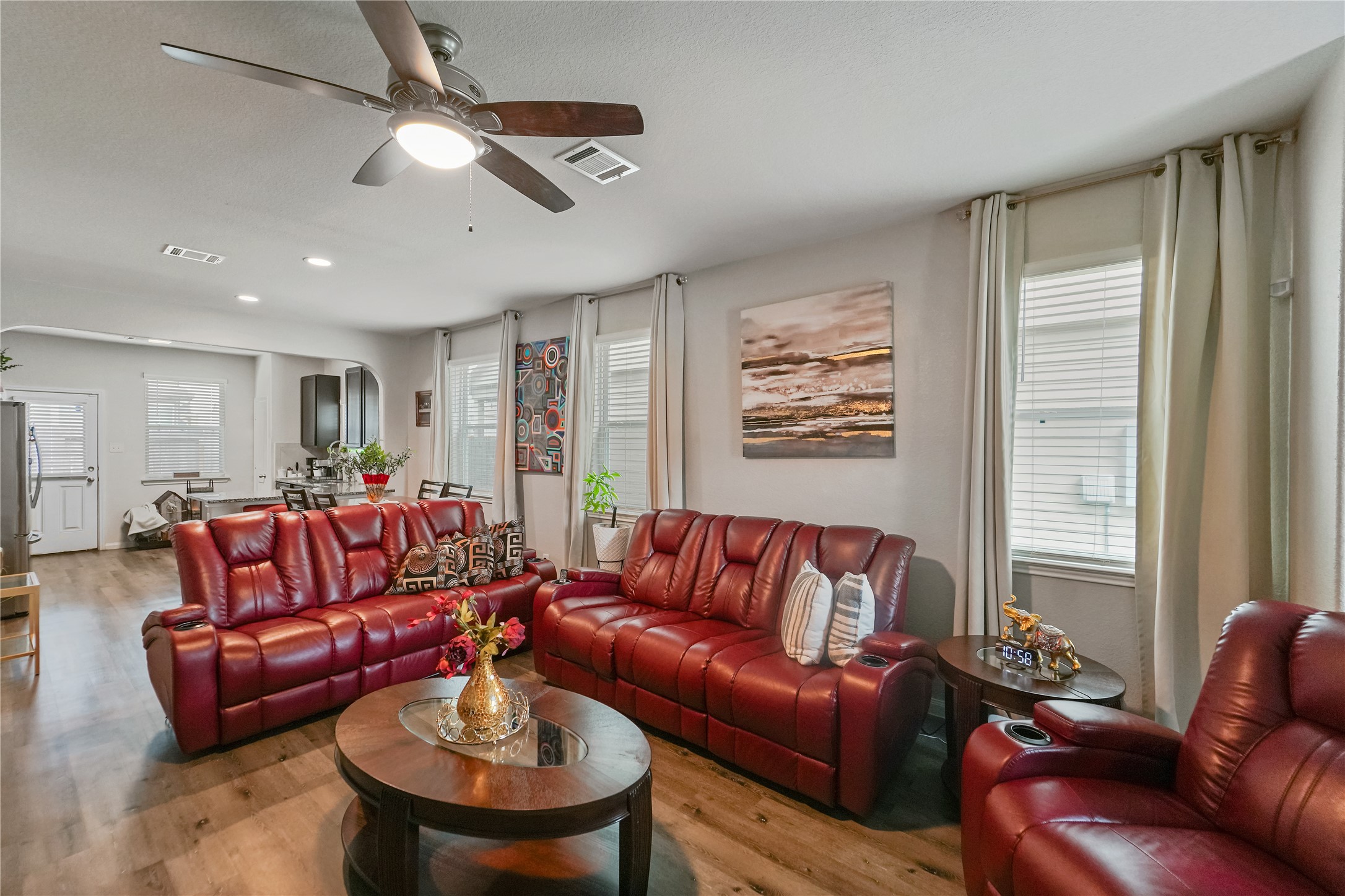 23659 Goodfellow Drive Spring, TX 77373 - Photo 5 of 25 a living room with furniture ceiling fan and a window