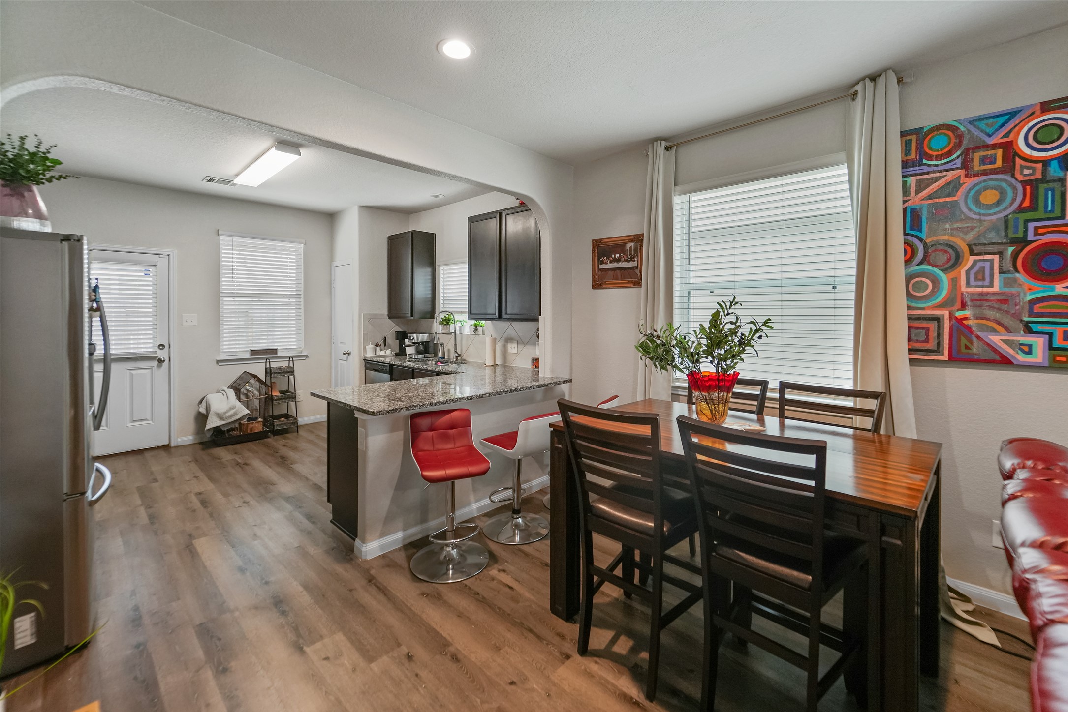 23659 Goodfellow Drive Spring, TX 77373 - Photo 6 of 25 a view of a dining room with furniture and a kitchen