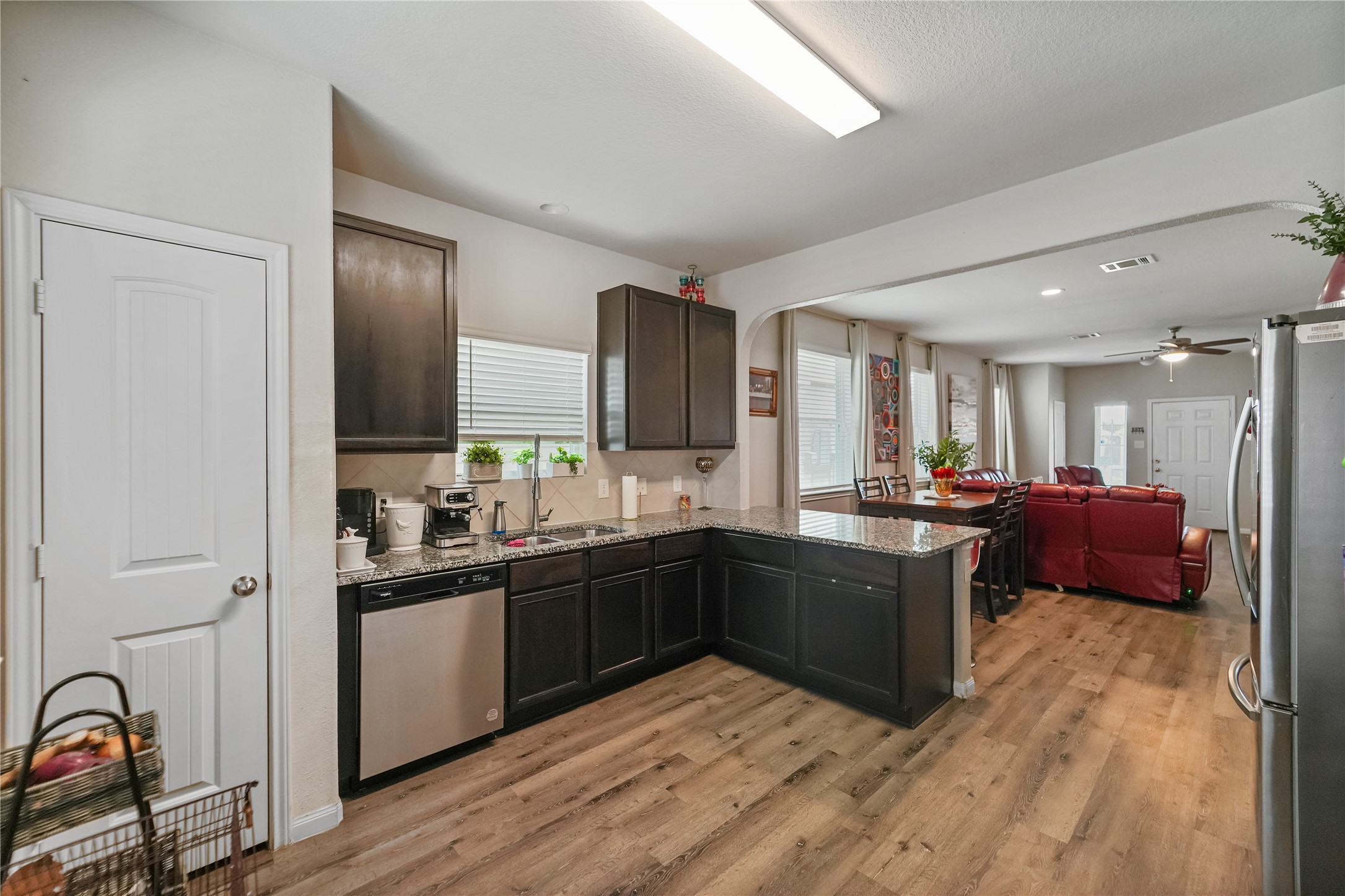 23659 Goodfellow Drive Spring, TX 77373 - Photo 8 of 25 a large kitchen with a sink and cabinets