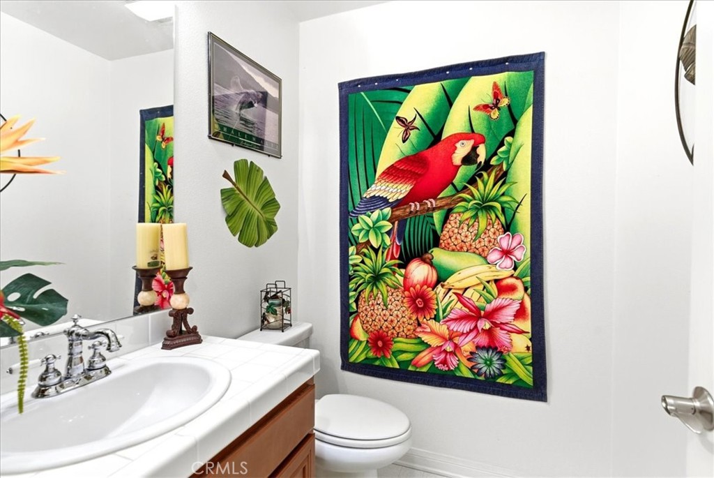 17715 Timberview Drive Riverside, CA 92504 - Photo 20 of 46 a bathroom with a sink mirror and vanity