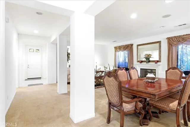 a spacious bathroom with a double vanity sink and a mirror