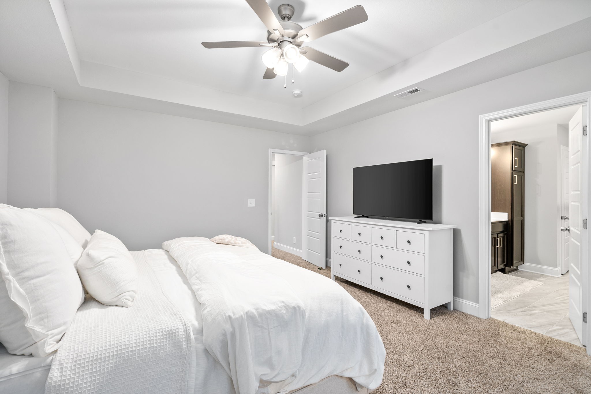 206 Clark Road Clarksville, TN 37042 - Photo 20 of 37 a bedroom with a bed and a flat screen tv
