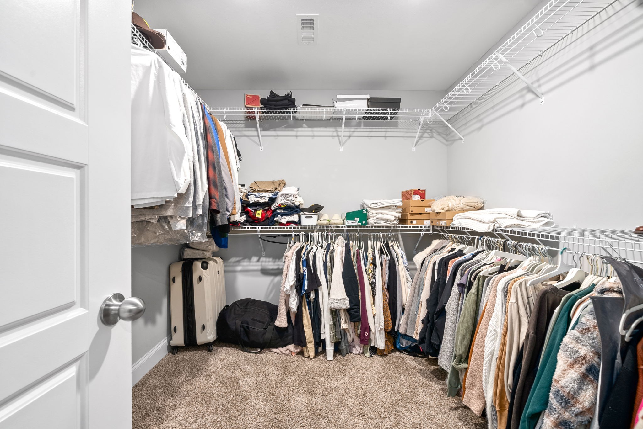 206 Clark Road Clarksville, TN 37042 - Photo 26 of 37 a view of walk in closet with clothes and shoes