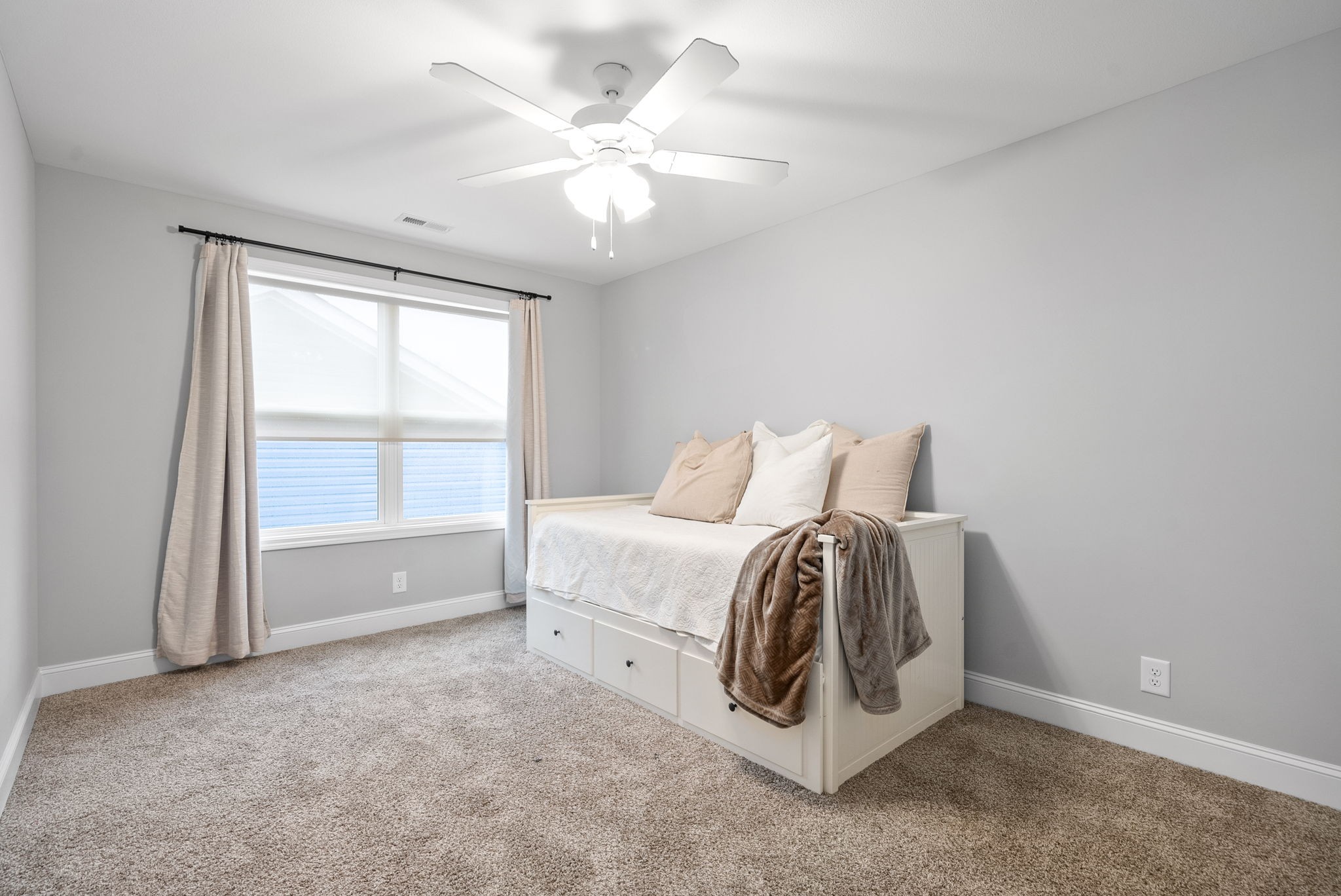 206 Clark Road Clarksville, TN 37042 - Photo 27 of 37 a room with a bed and a window