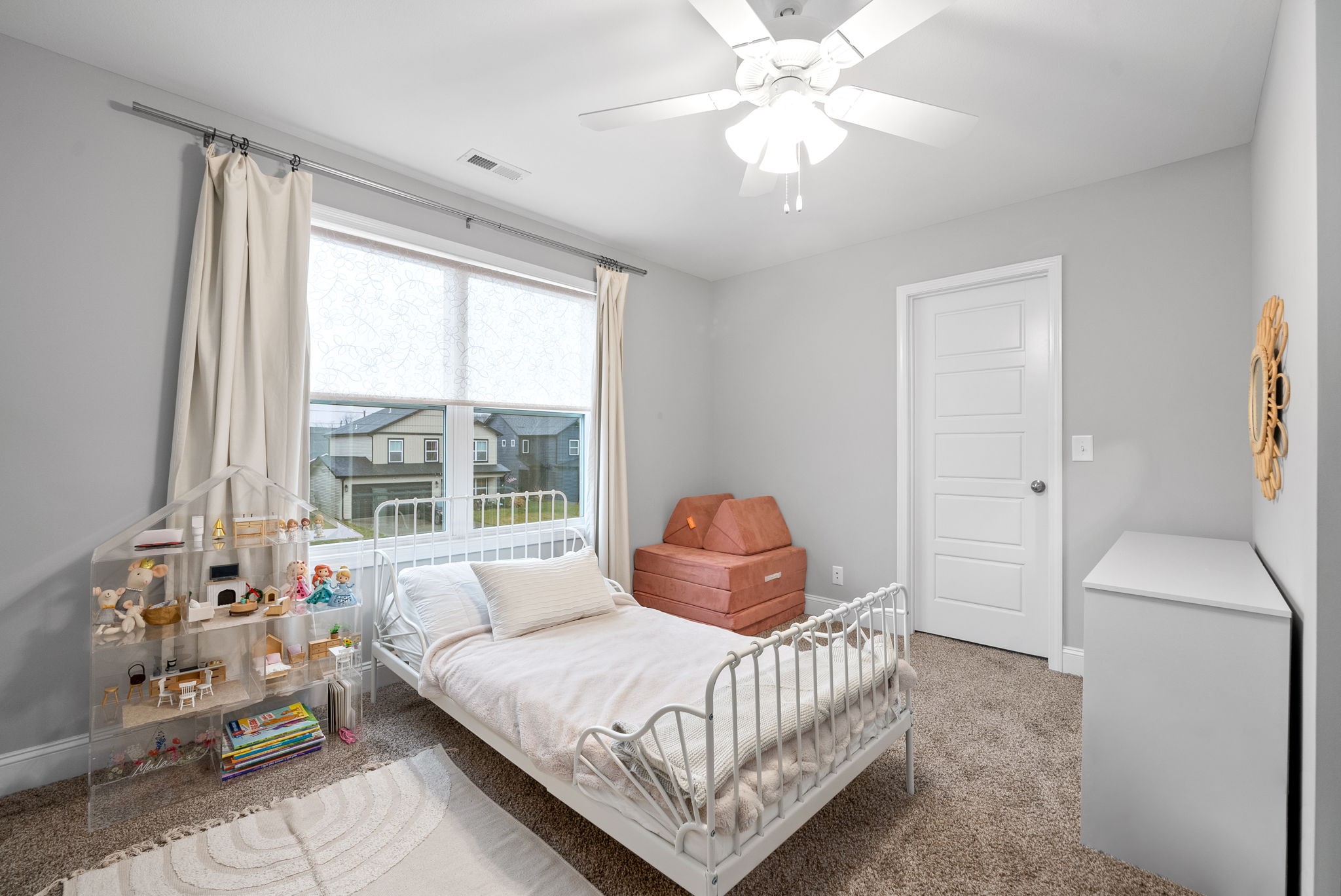 206 Clark Road Clarksville, TN 37042 - Photo 30 of 37 a bedroom with a bed and a chandelier