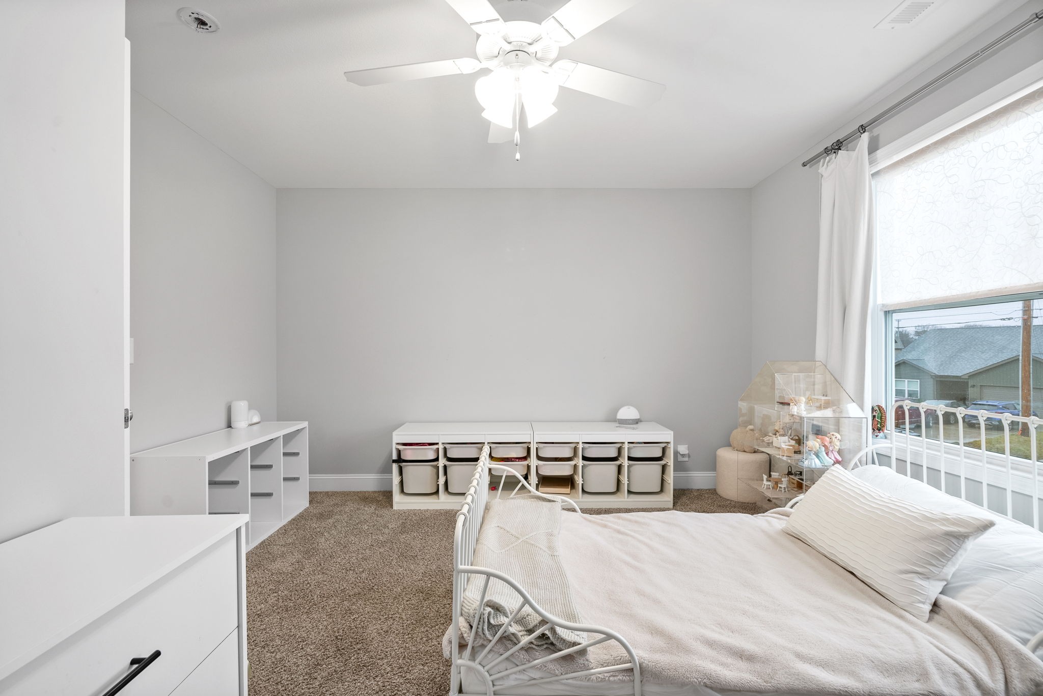 206 Clark Road Clarksville, TN 37042 - Photo 31 of 37 a bedroom with a bed and a chandelier