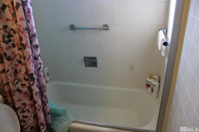 a bathroom with a bathtub