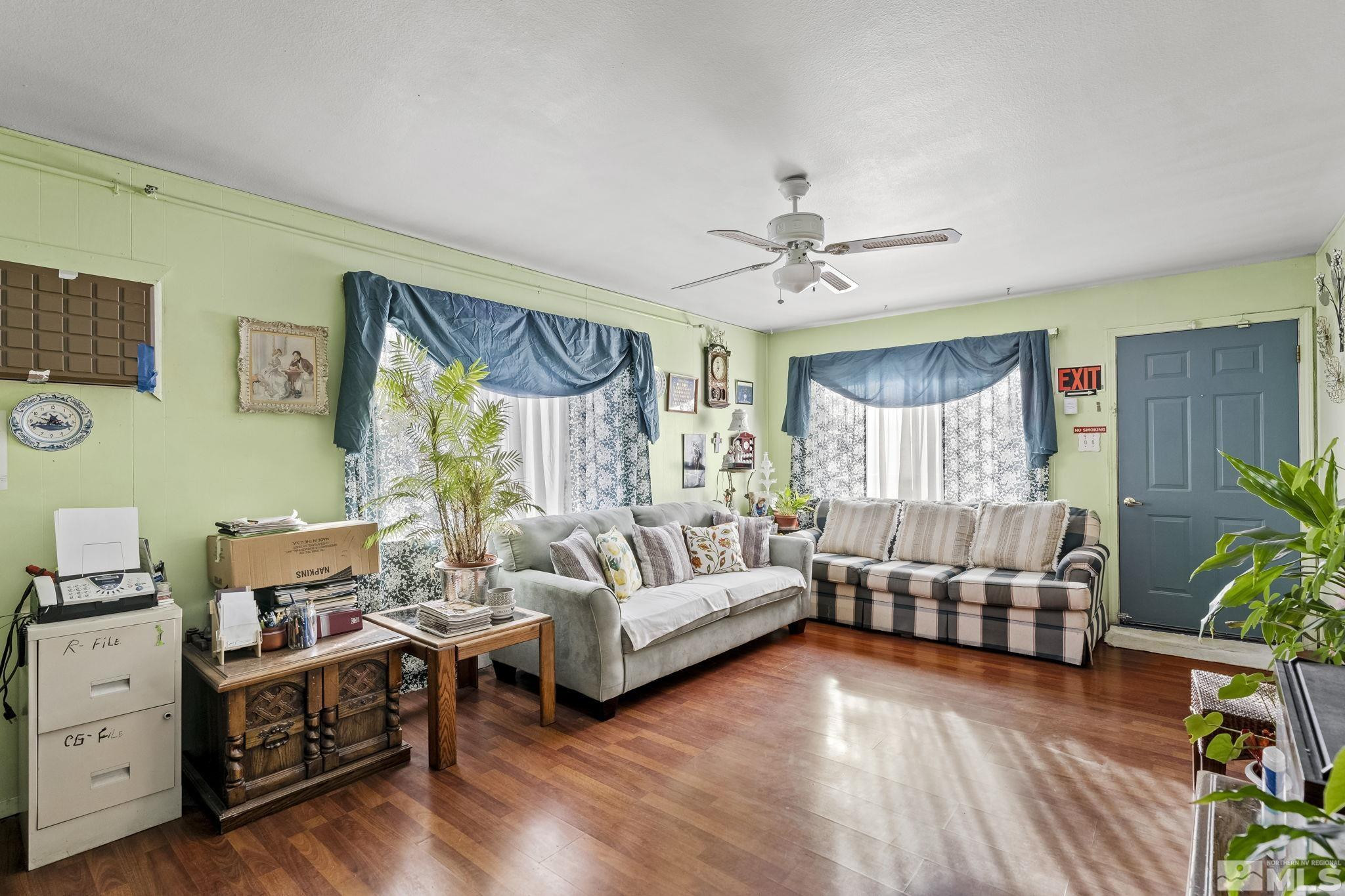 1885 Castle Way Reno, NV 89512 - Photo 3 of 18 a living room with furniture and a large window