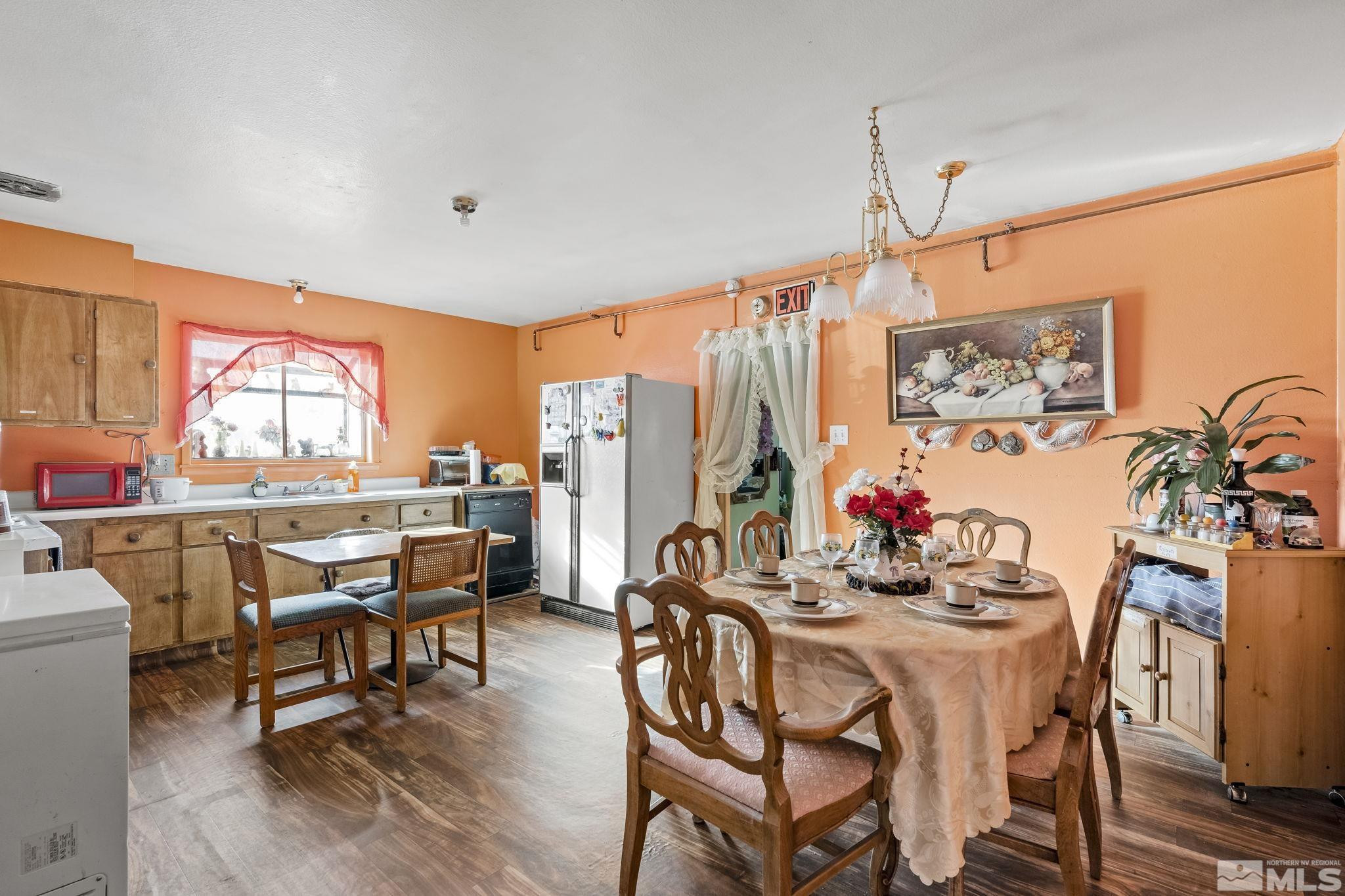 1885 Castle Way Reno, NV 89512 - Photo 4 of 18 a view of a dining room with furniture window and outside view