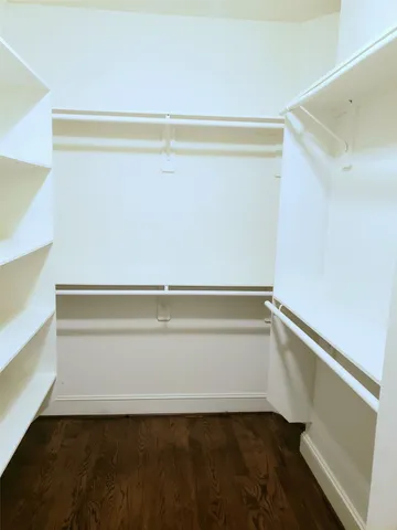 a view of an empty walk in closet