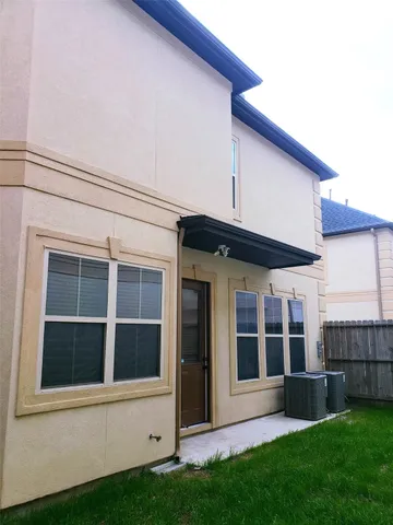 a view of a backyard of the house