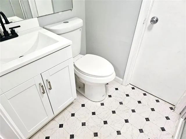 a bathroom with a sink and a toilet