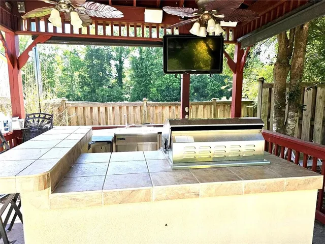 a backyard of a house with lots of green space