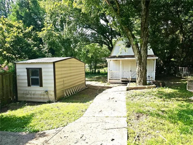 a room with gym equipment and a window