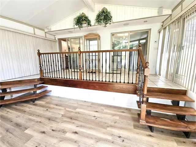 a view of a porch with a bench