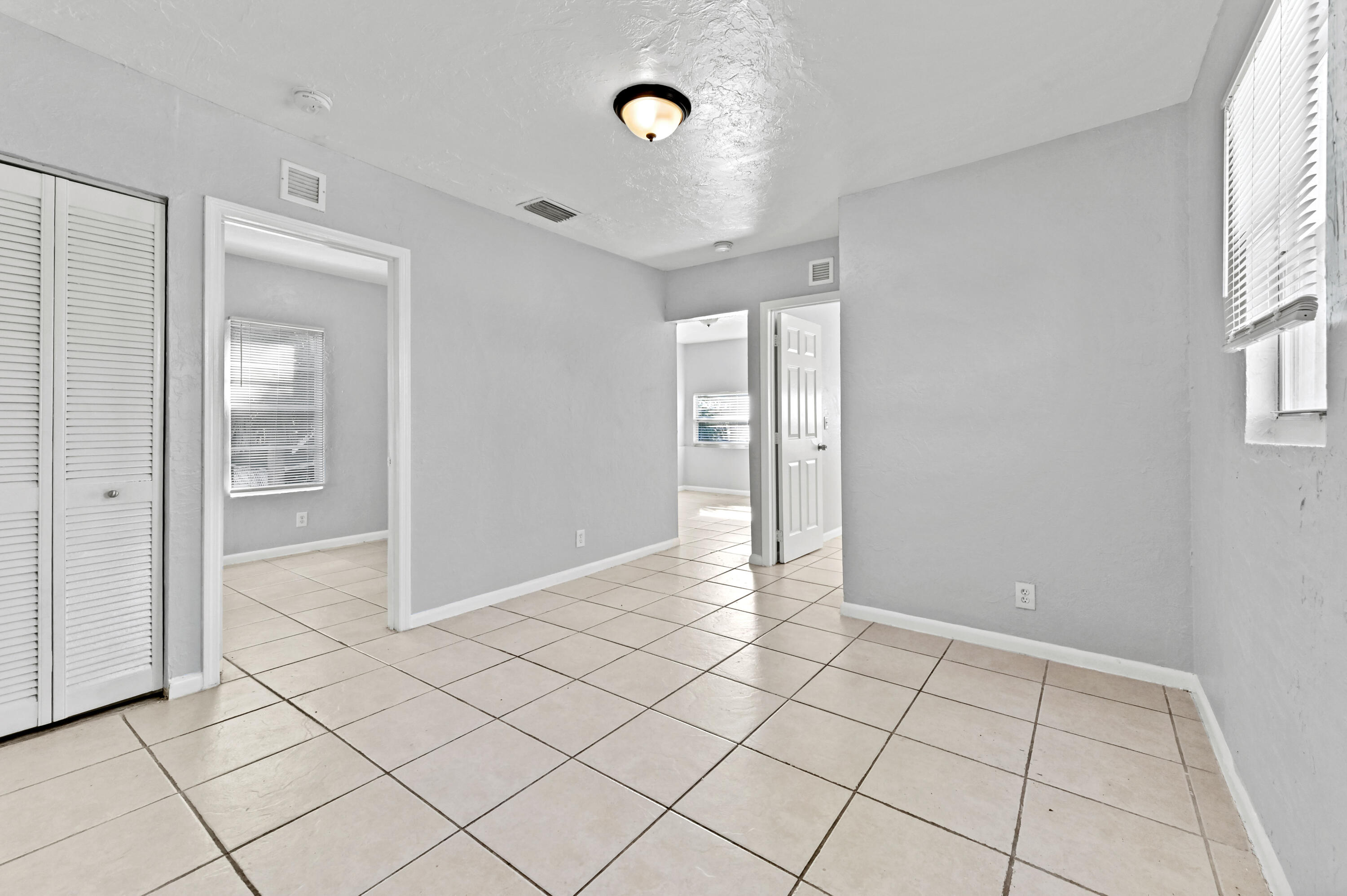 515 Putnam Road West Palm Beach, FL 33405 - Photo 11 of 23 a view of an empty room and window