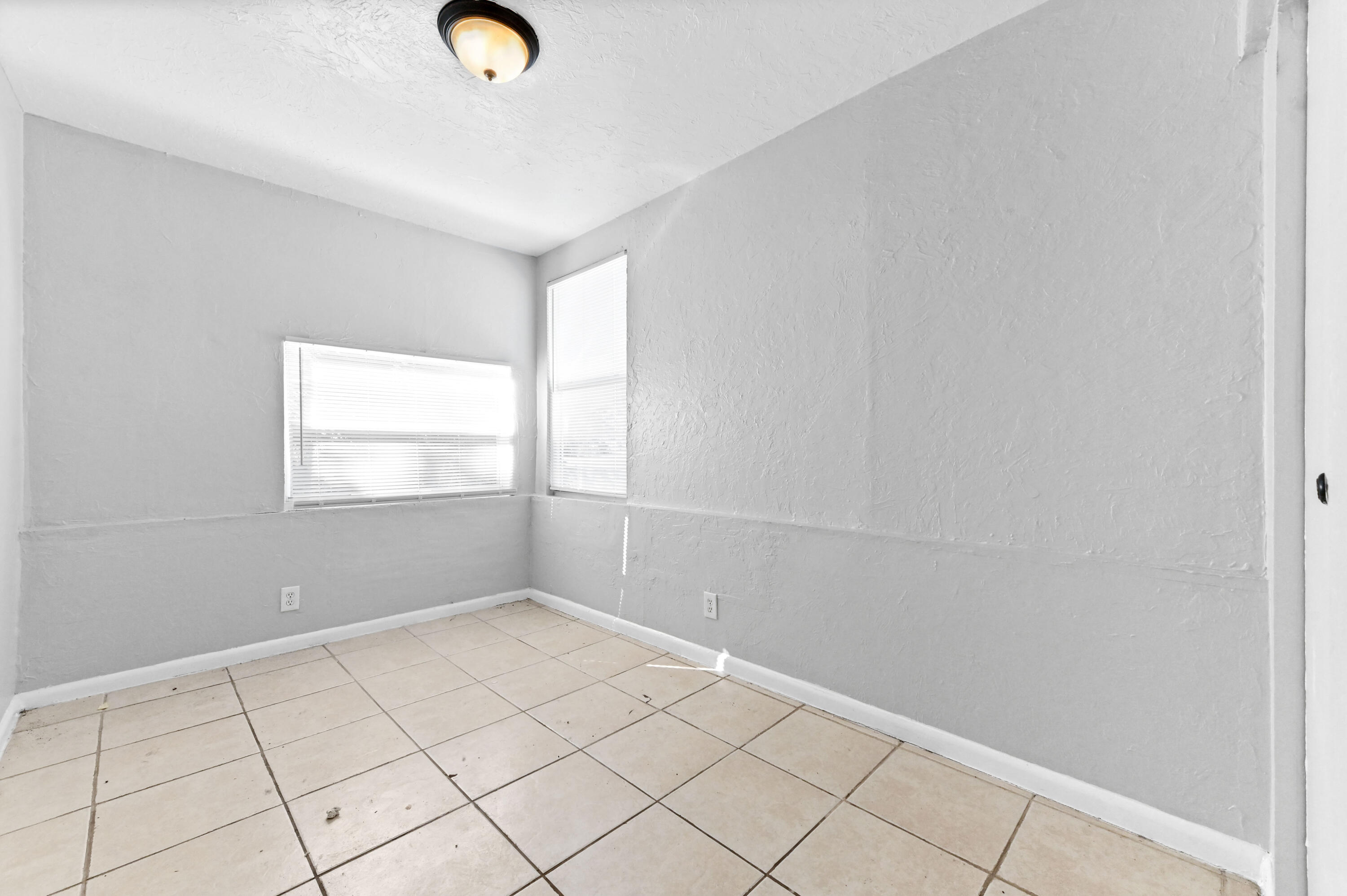 515 Putnam Road West Palm Beach, FL 33405 - Photo 18 of 23 a view of an empty room and window