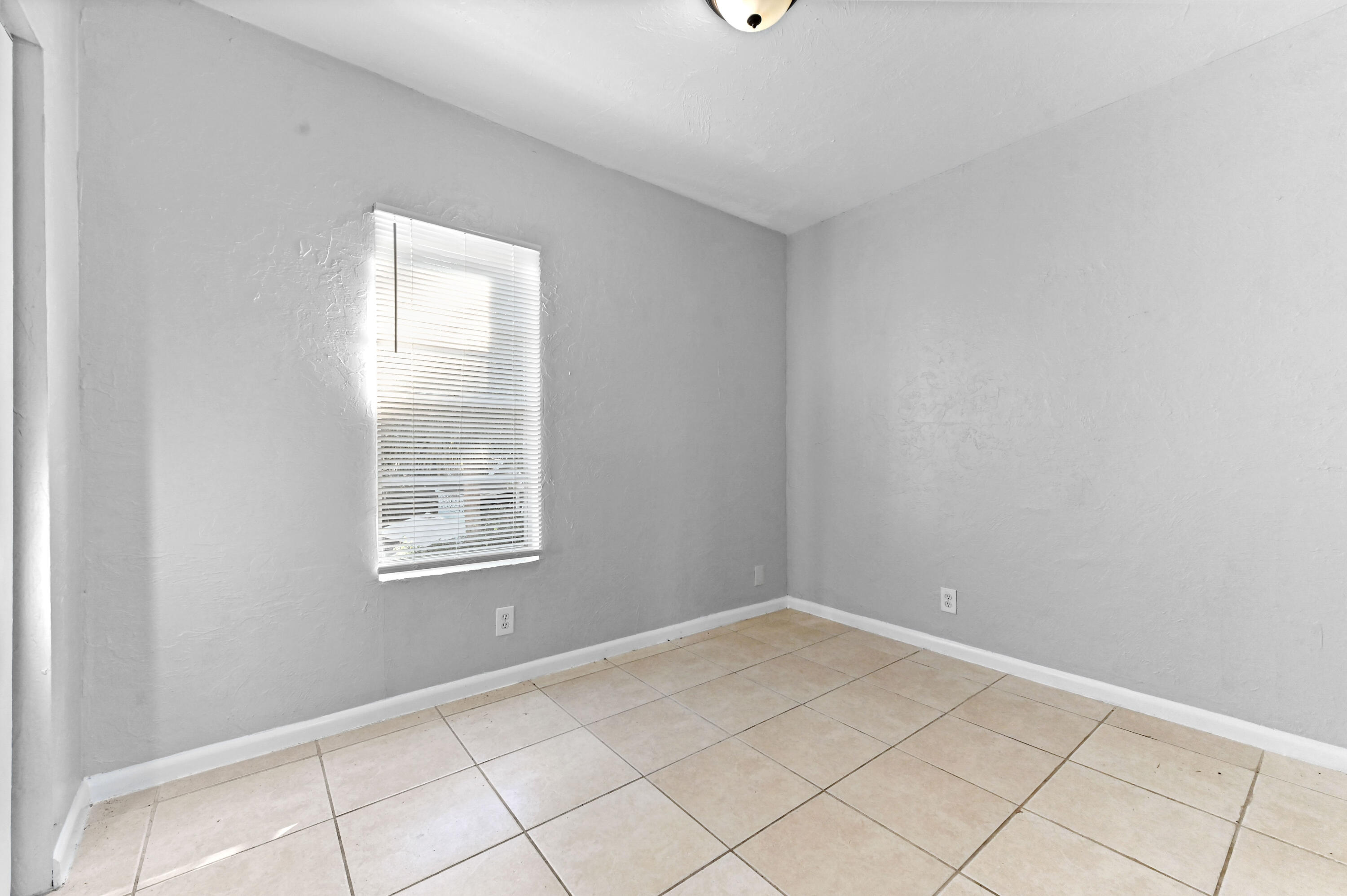 515 Putnam Road West Palm Beach, FL 33405 - Photo 20 of 23 an empty room with windows