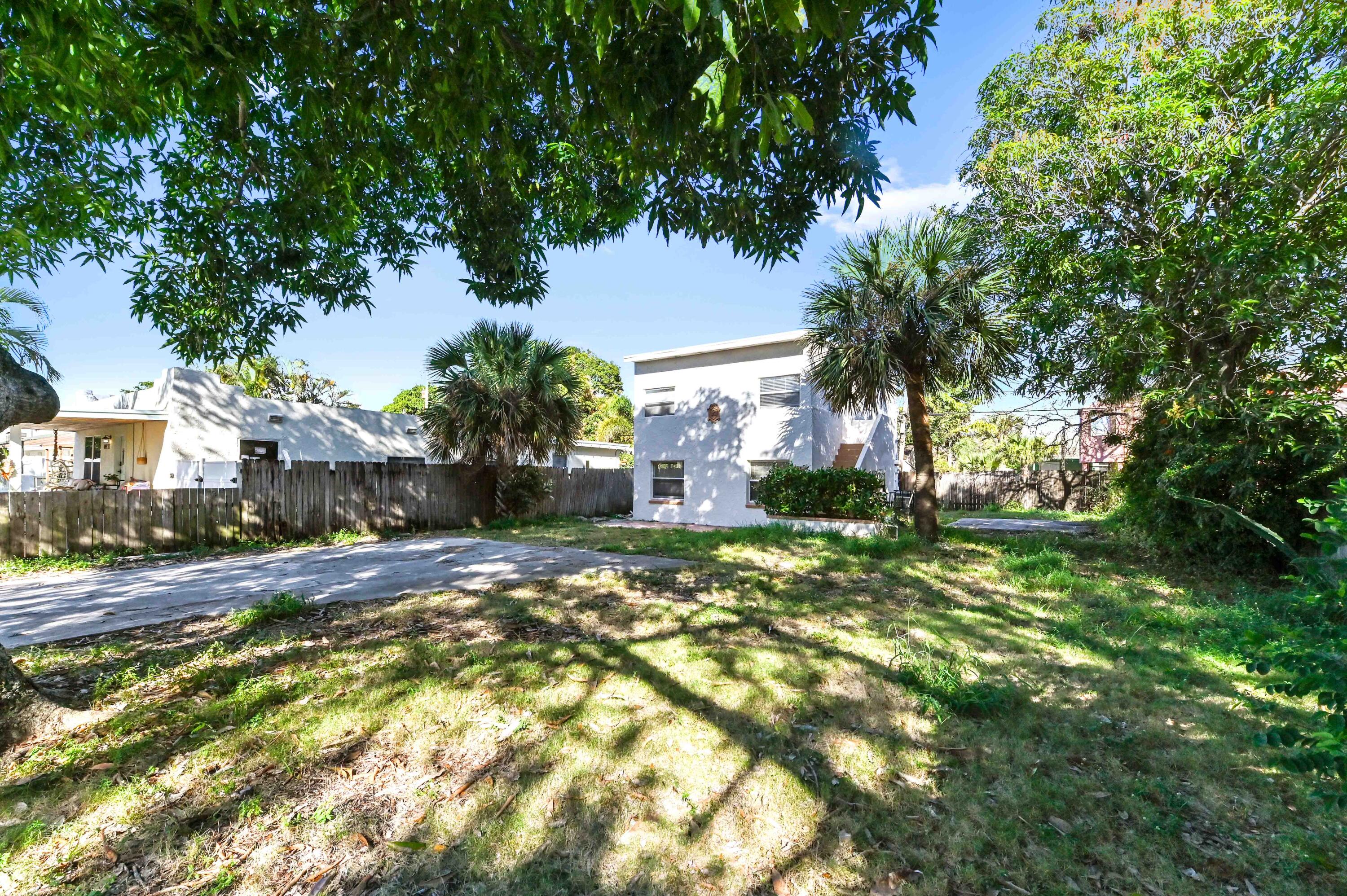 515 Putnam Road West Palm Beach, FL 33405 - Photo 2 of 23 a view of a yard with plants and trees