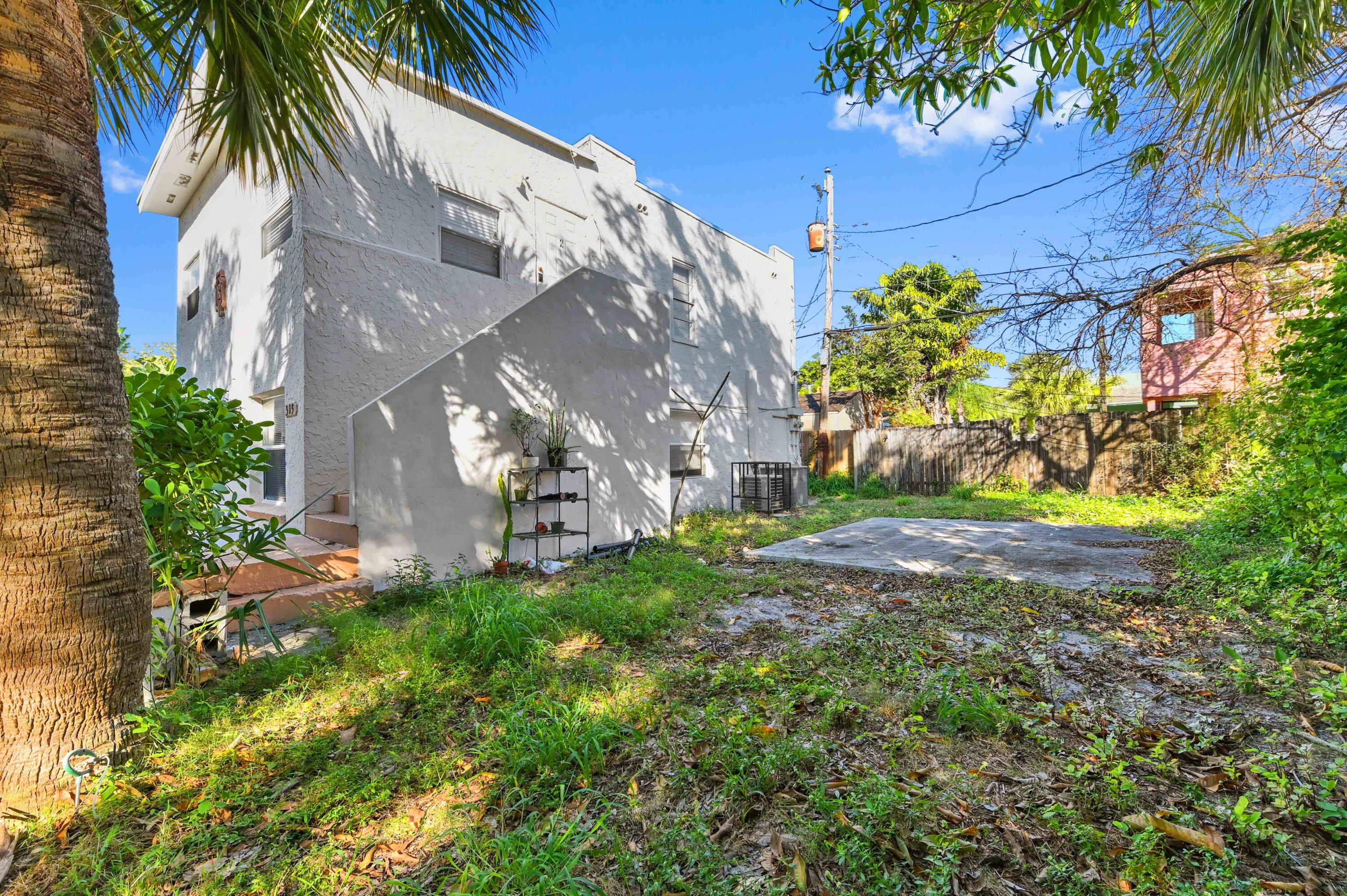 515 Putnam Road West Palm Beach, FL 33405 - Photo 22 of 23 a view of a yard with plants and trees