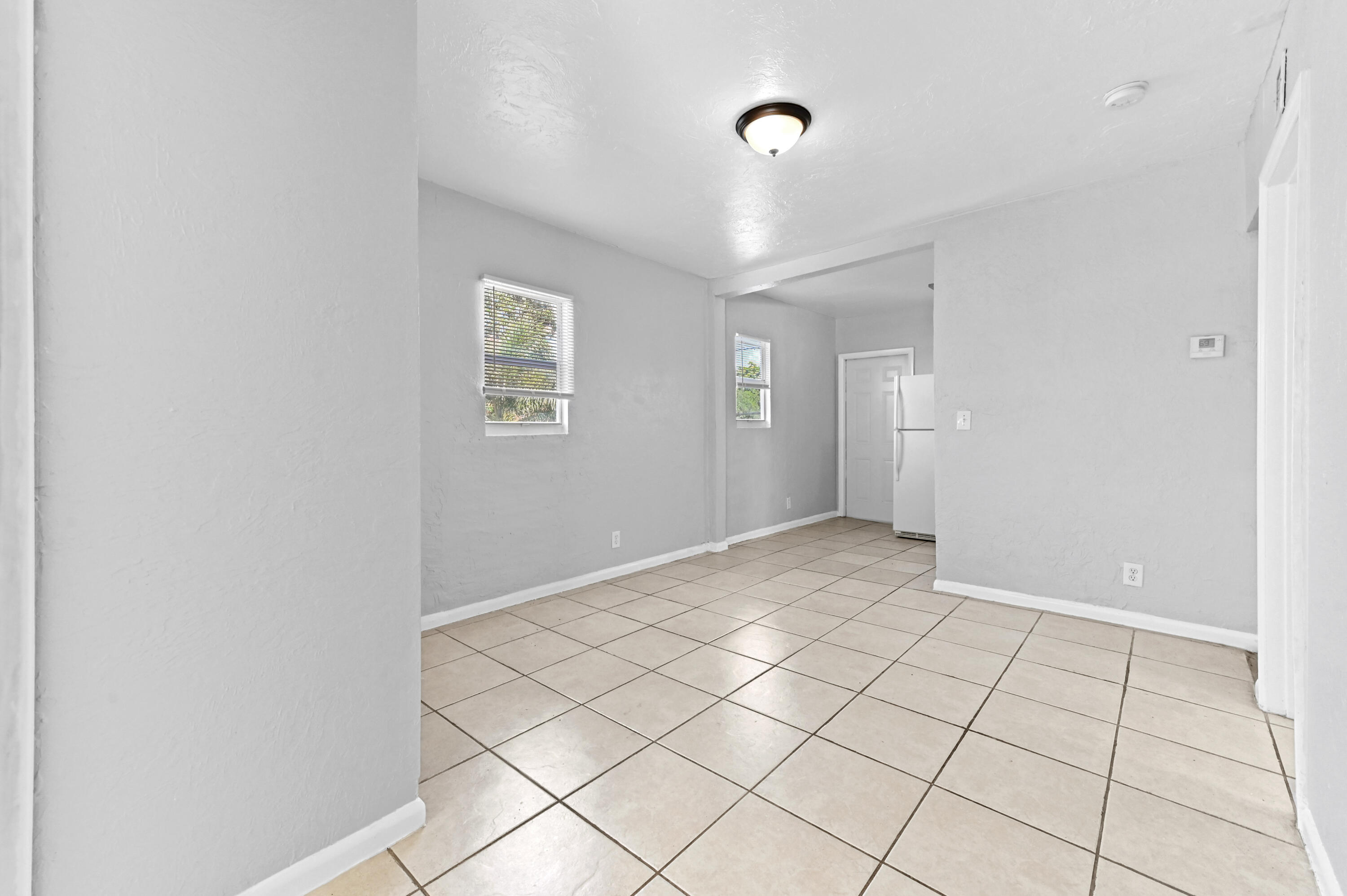 515 Putnam Road West Palm Beach, FL 33405 - Photo 9 of 23 a view of an empty room and window