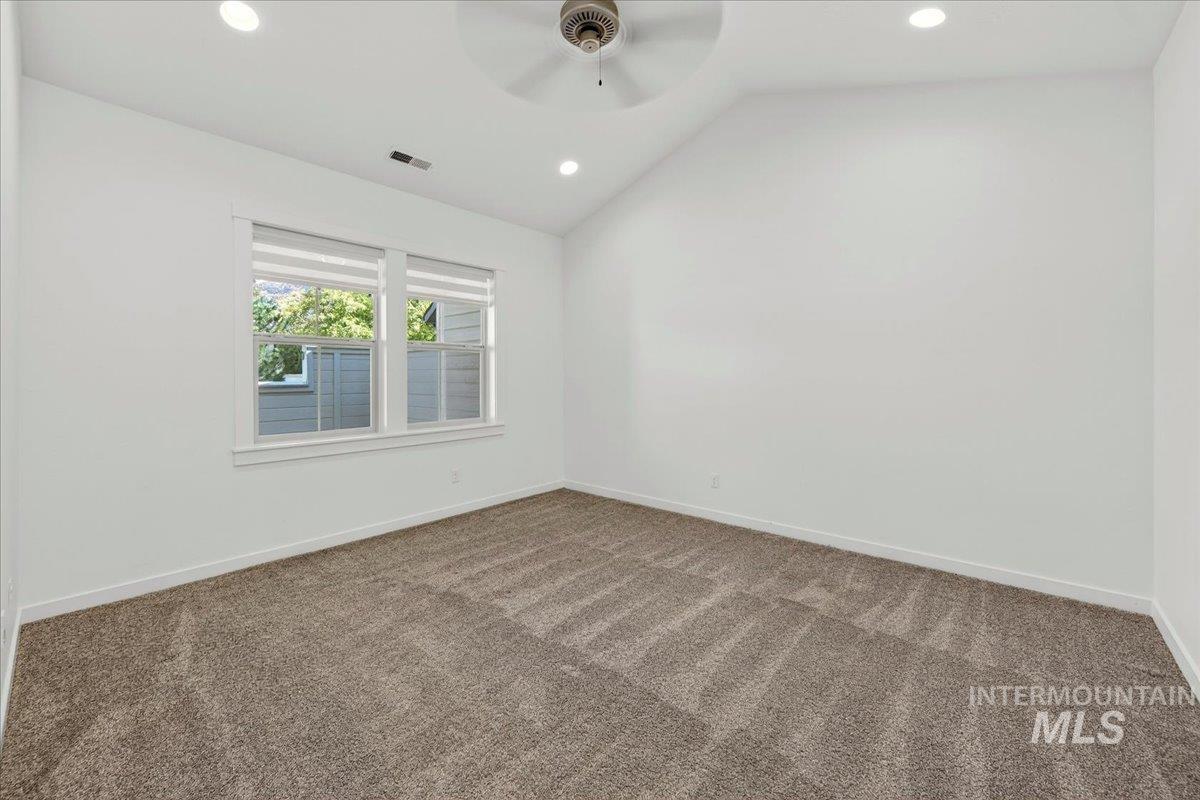 4204 East Silverking Lane Meridian, ID 83642 - Photo 23 of 40 Vaulted ceiling featuring a ceiling fan and recessed lighting