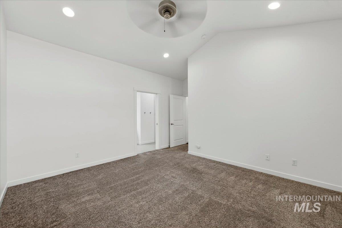 4204 East Silverking Lane Meridian, ID 83642 - Photo 25 of 40 Spacious room featuring neutral carpeting and white walls