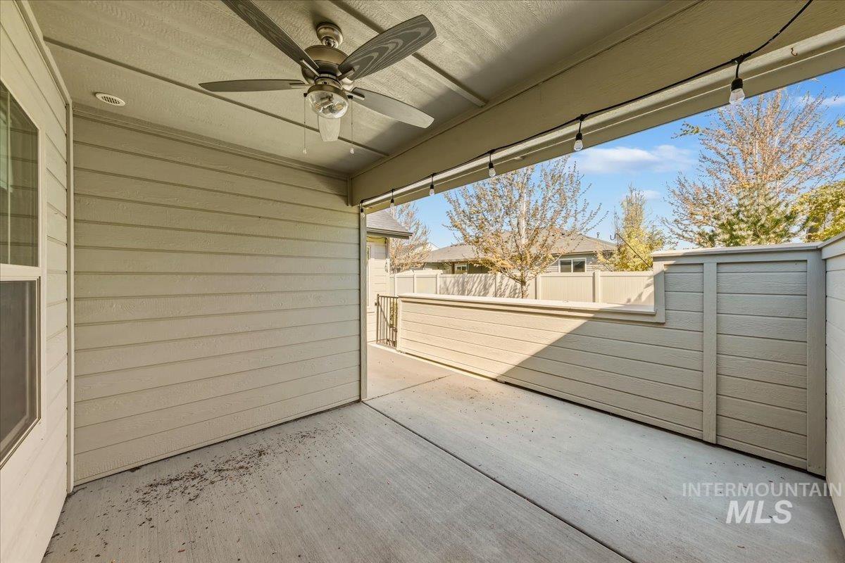 4204 East Silverking Lane Meridian, ID 83642 - Photo 34 of 40 Covered patio featuring a ceiling fan, recessed lighting, string lights, and concrete flooring
