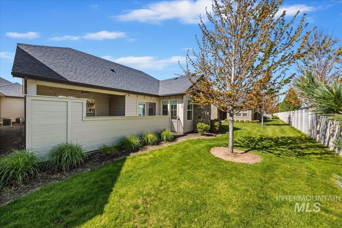 4204 East Silverking Lane Meridian, ID 83642 - Photo 35 of 40 Expansive green lawn featuring a young deciduous tree and perimeter fencing
