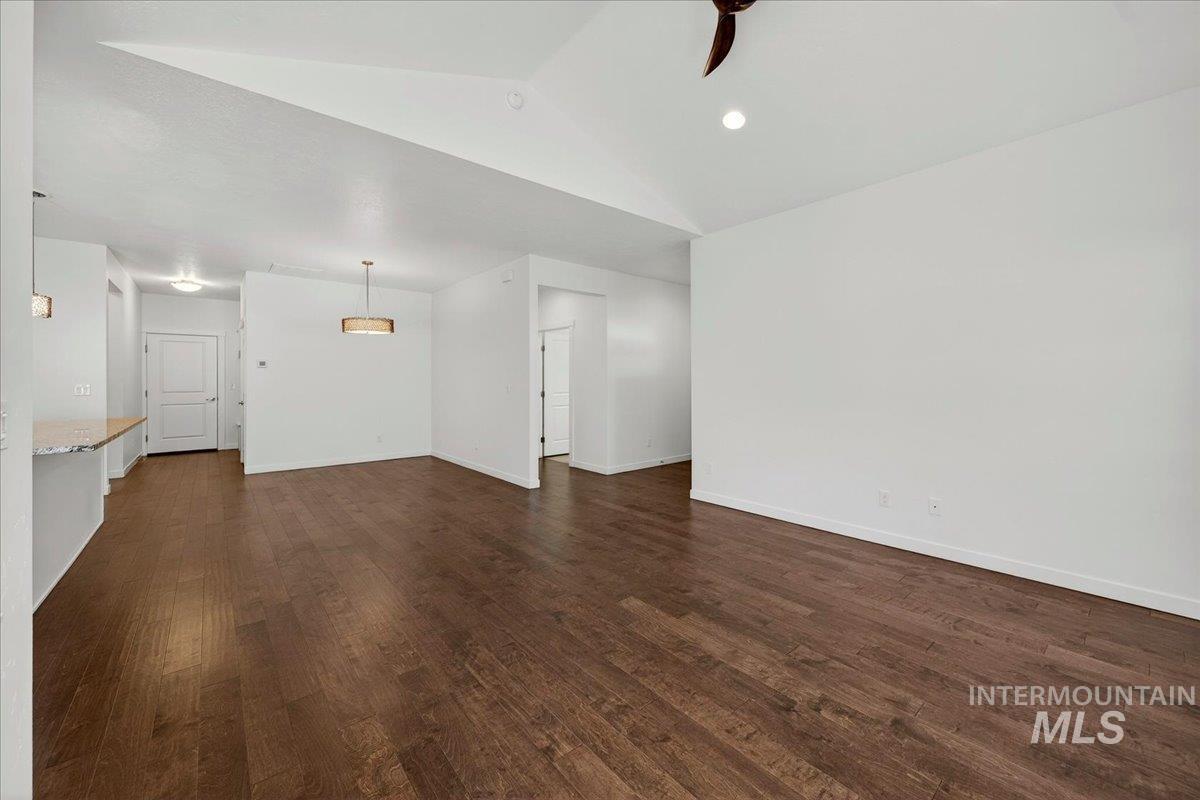 4204 East Silverking Lane Meridian, ID 83642 - Photo 9 of 40 Spacious interior featuring wood-finish flooring, vaulted ceilings, and recessed lighting