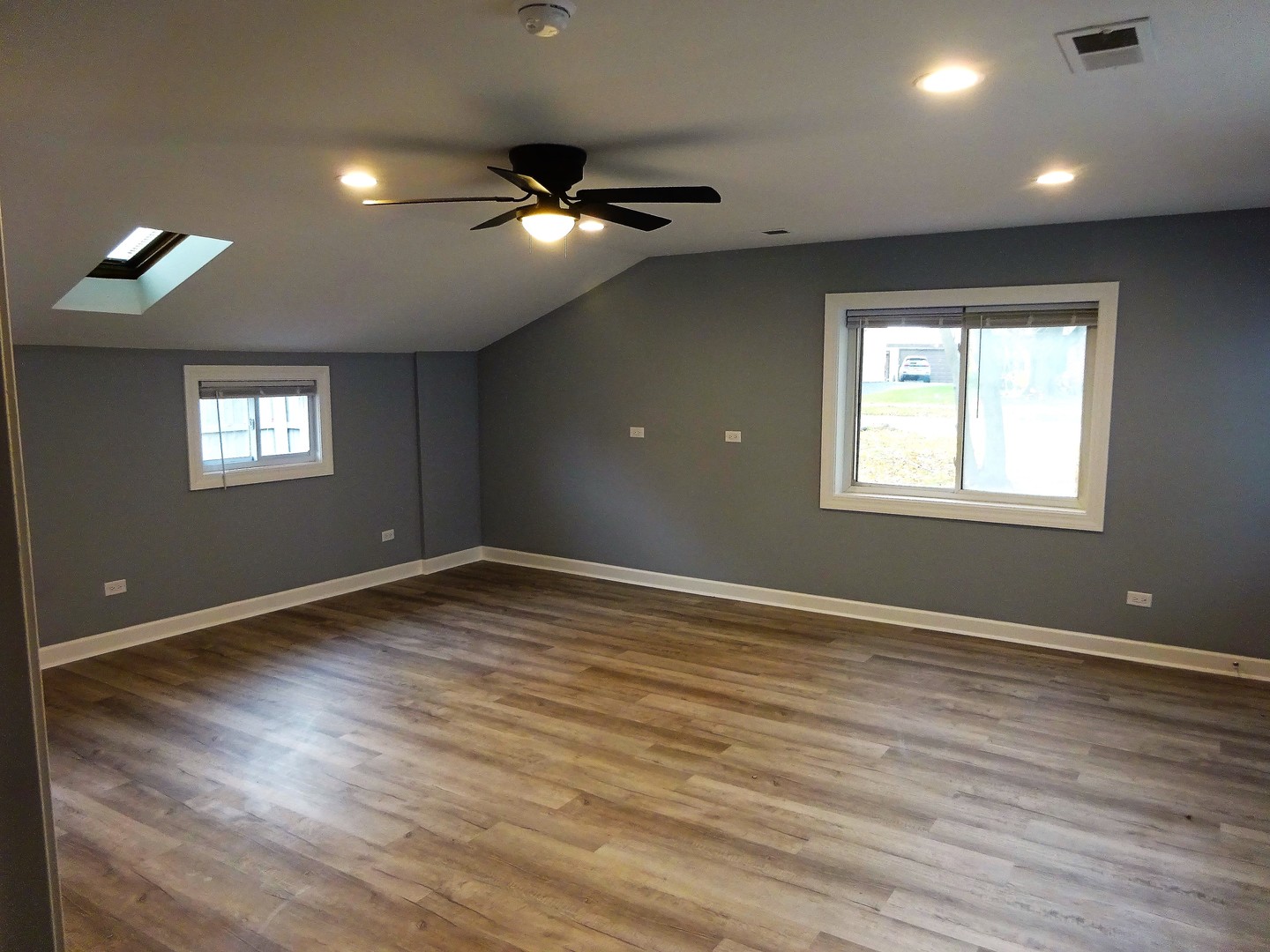169 South Pinecrest Road Bolingbrook, IL 60440 - Photo 20 of 63 a view of an empty room with wooden floor and a window