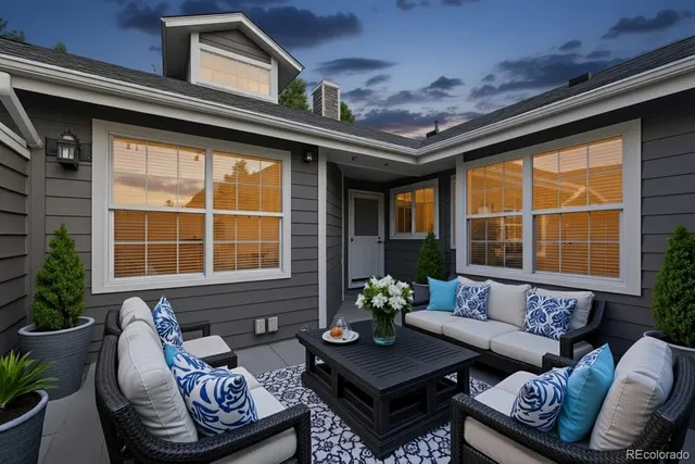 a outdoor living space with furniture and a potted plant