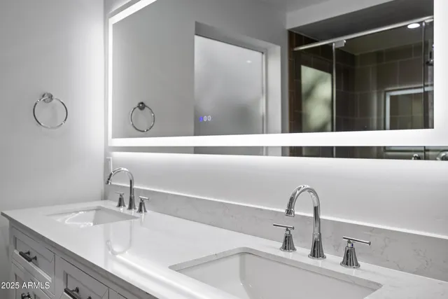 a view of a city with mountains in the background