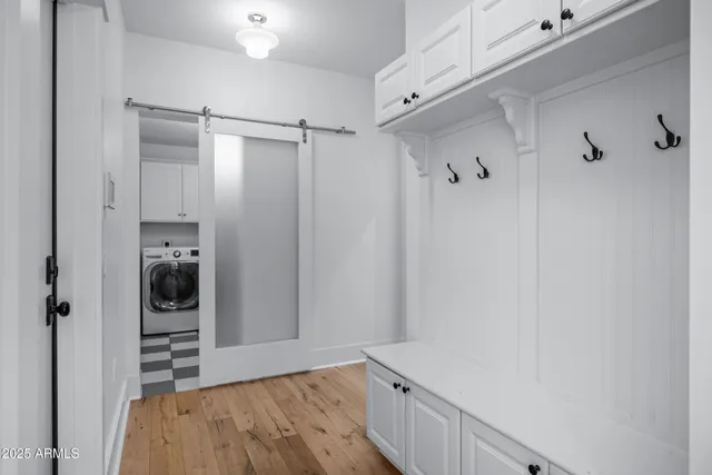 an aerial view of residential houses with city view