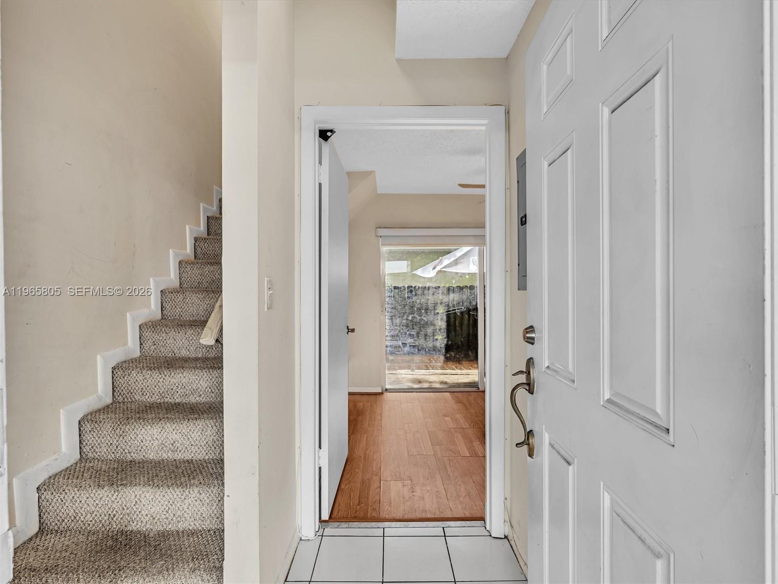 240 Southwest 15th Road, Unit 112 Miami, FL 33129 - Photo 13 of 47 a view of a hallway with wooden floor and entryway