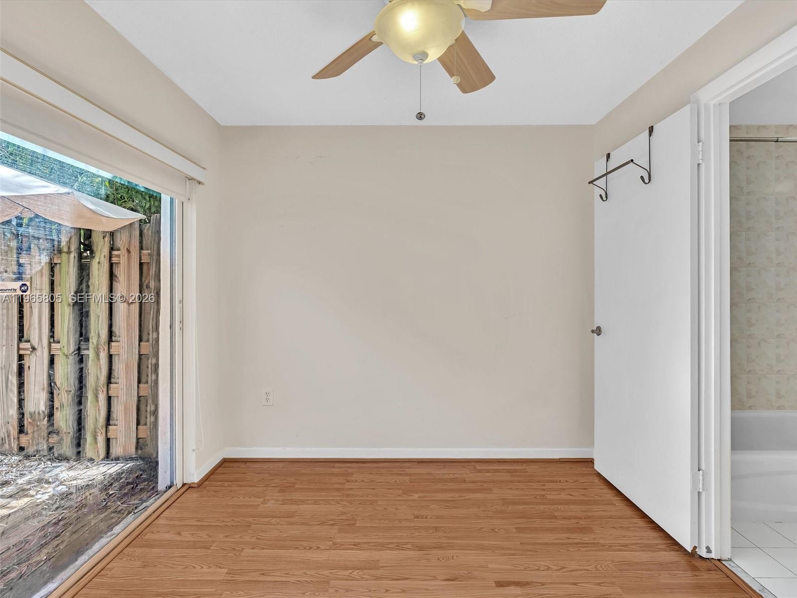 240 Southwest 15th Road, Unit 112 Miami, FL 33129 - Photo 18 of 47 a view of an empty room with wooden floor