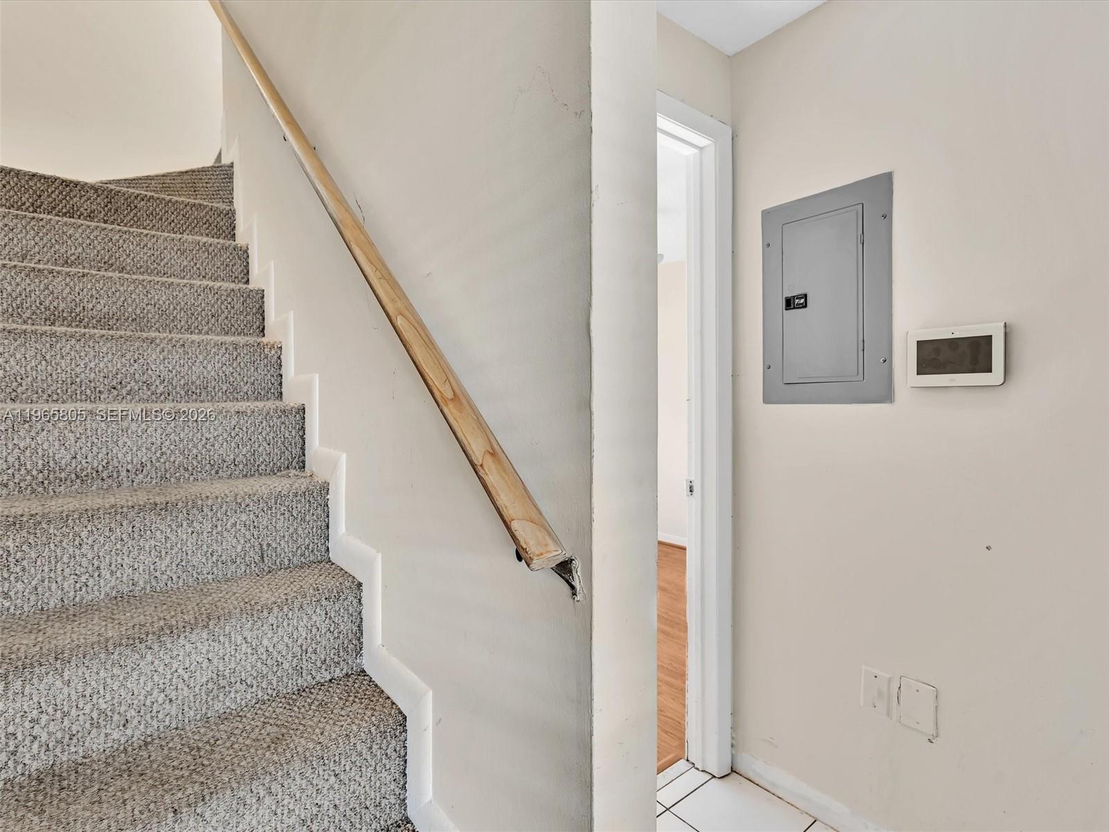 240 Southwest 15th Road, Unit 112 Miami, FL 33129 - Photo 20 of 47 a view of staircase with white walls and white walls