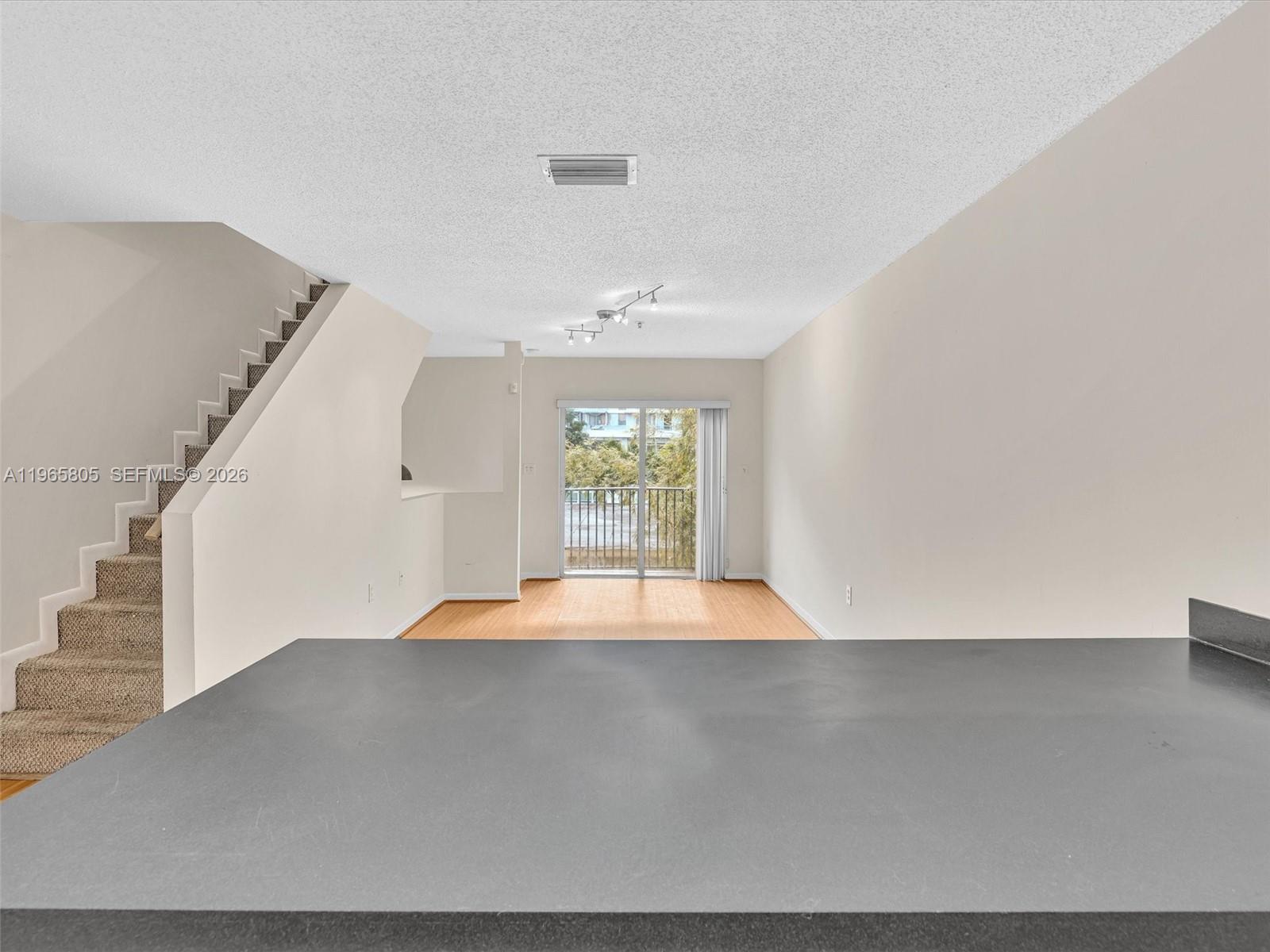 240 Southwest 15th Road, Unit 112 Miami, FL 33129 - Photo 27 of 47 a view of an empty room with a window