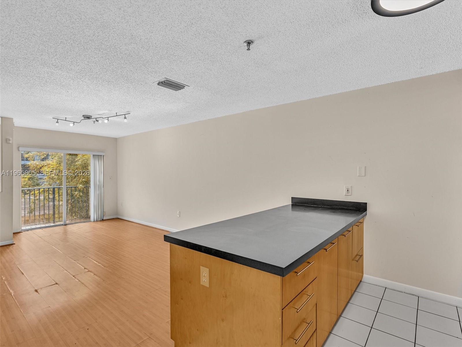 240 Southwest 15th Road, Unit 112 Miami, FL 33129 - Photo 29 of 47 a view of an empty room and window