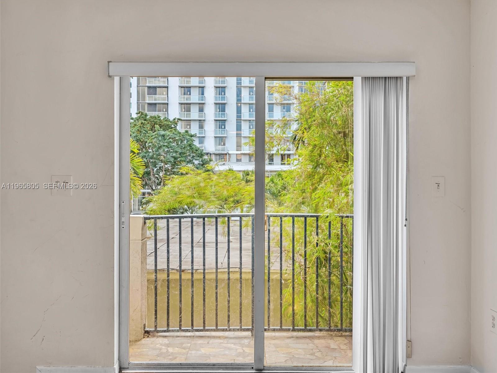 240 Southwest 15th Road, Unit 112 Miami, FL 33129 - Photo 34 of 47 a view of a balcony