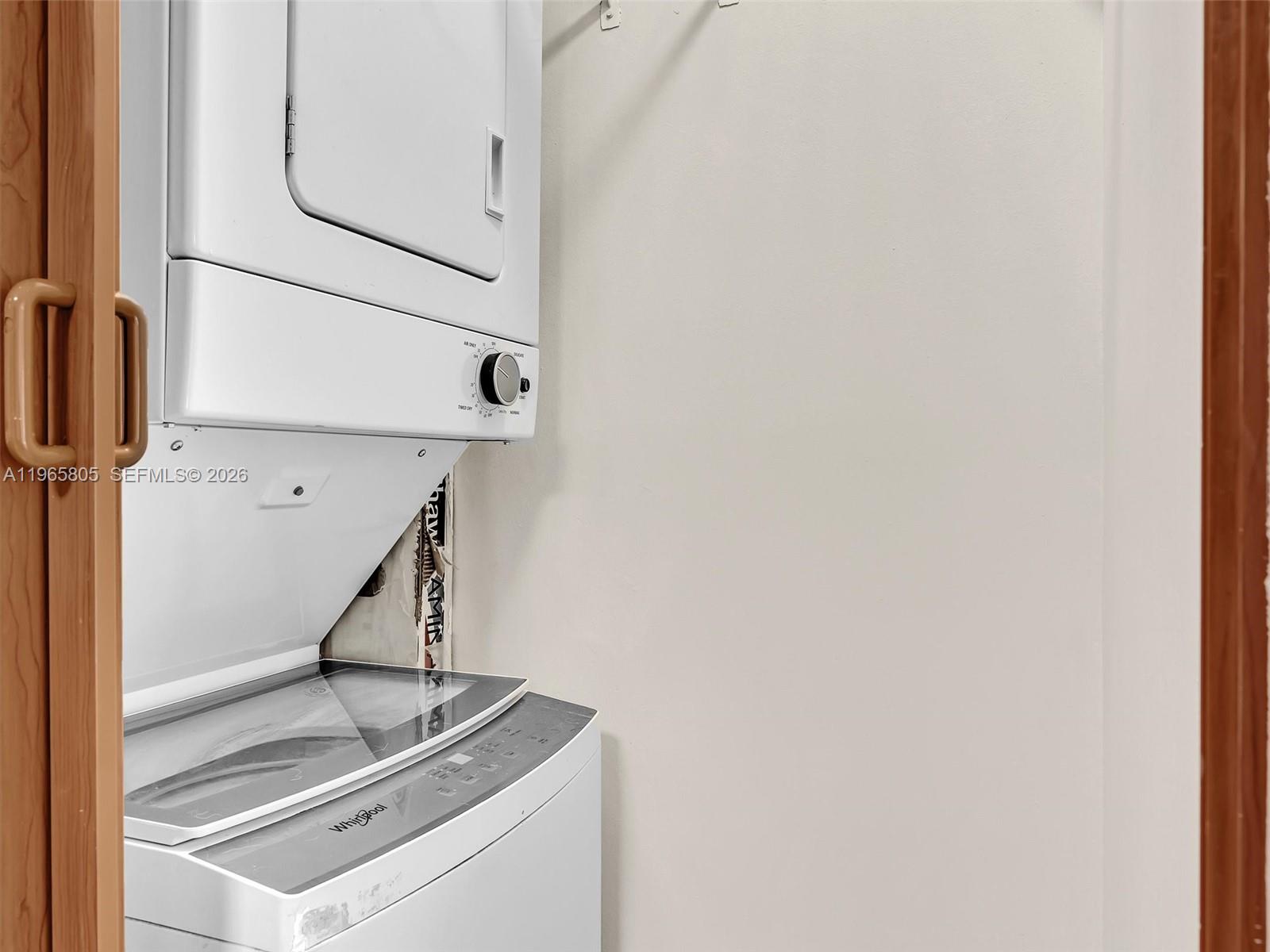 240 Southwest 15th Road, Unit 112 Miami, FL 33129 - Photo 10 of 47 a view of storage and utility room with stairs