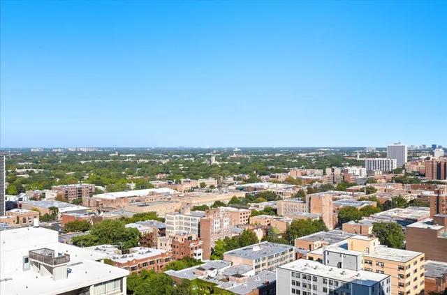a view of a city with tall buildings