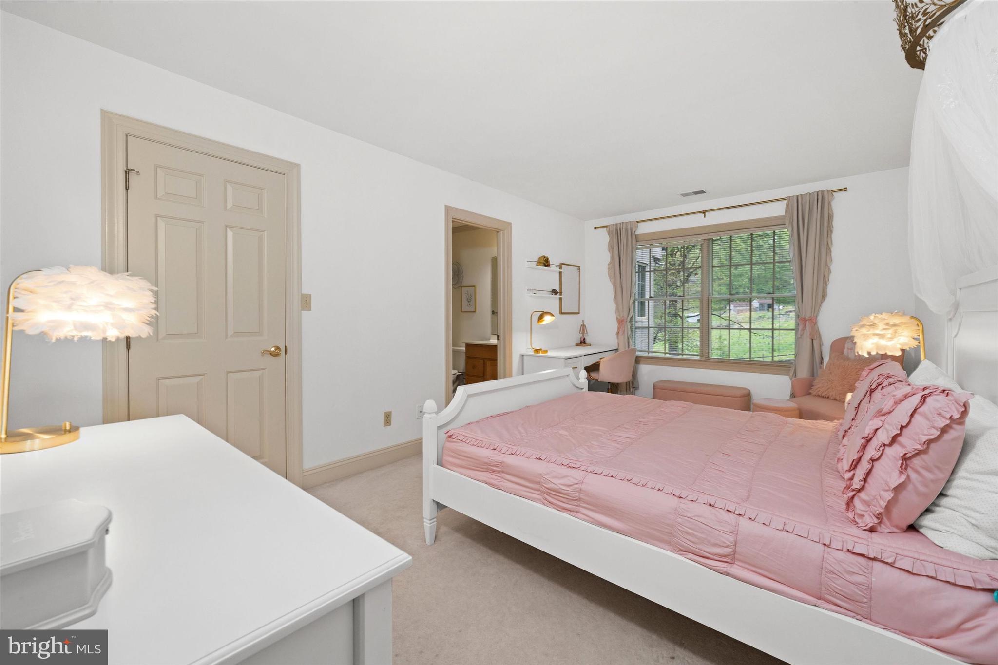 1618 Snuff Mill Road Hockessin, DE 19707 - Photo 28 of 48 a bedroom with a bed and a window