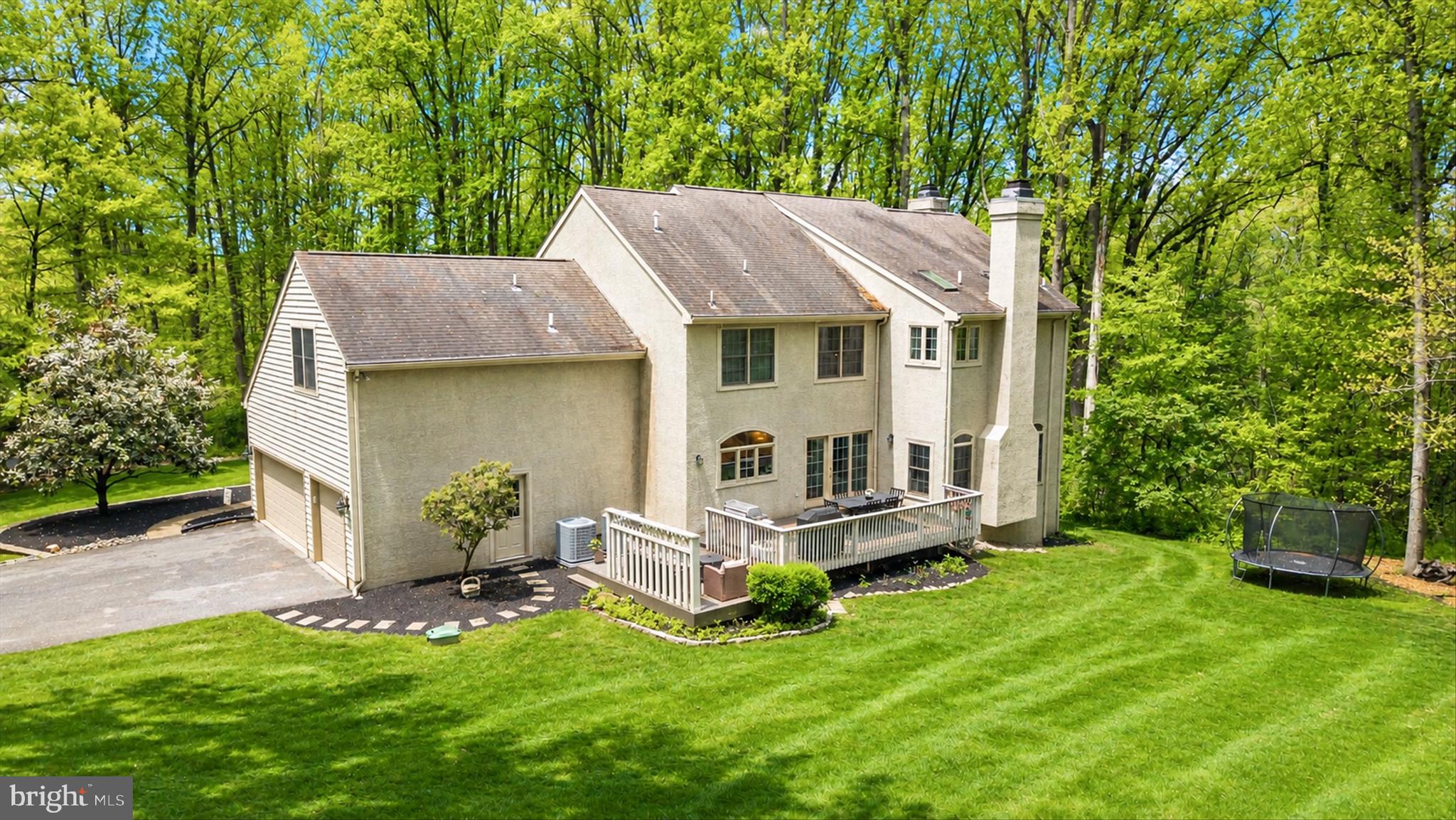 1618 Snuff Mill Road Hockessin, DE 19707 - Photo 42 of 48 a aerial view of a house with a yard table and chairs